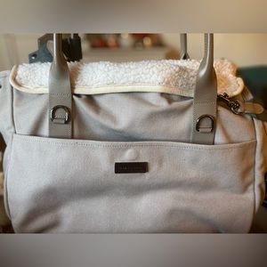 Beautifully made shoulder tote for your favorite 4 legged bestie! Gently used